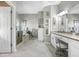 Spacious bathroom with dual vanity, walk-in shower, and soaking tub at 16118 Lytham Dr, Odessa, FL 33556