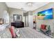 Comfortable bedroom with neutral walls, complemented by colorful bedding and decor at 16118 Lytham Dr, Odessa, FL 33556