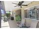 Relaxing covered lanai with comfortable seating, a ceiling fan, and a peaceful outdoor atmosphere at 16118 Lytham Dr, Odessa, FL 33556