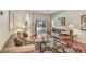 The beautiful living room features stylish furnishings, wood floors, and an open layout at 16118 Lytham Dr, Odessa, FL 33556