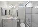 Bathroom with a tiled shower and tub combination, and vanity with a mirror at 16629 Sedona De Avila, Tampa, FL 33613