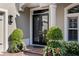 Close-up of the front door with beautiful landscaping at 16629 Sedona De Avila, Tampa, FL 33613