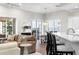 Open-concept living room with hardwood floors, neutral decor and sliders to the outdoor living area at 16629 Sedona De Avila, Tampa, FL 33613