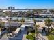Scenic aerial shot of waterfront homes along canals with docks, offering picturesque views of a coastal community at 17730 Long Point Dr, Redington Shores, FL 33708