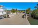 Spacious waterfront dock with seating and lush tropical landscaping at 17730 Long Point Dr, Redington Shores, FL 33708