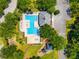 Overhead view of the community pool featuring a playground and lounging areas for residents to enjoy at 18310 Bankston Pl, Tampa, FL 33647