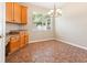 Bright dining area with tile floors and a chandelier at 18310 Bankston Pl, Tampa, FL 33647