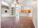Spacious living room with tile flooring open to the kitchen area at 18310 Bankston Pl, Tampa, FL 33647