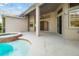 Backyard pool area with a covered patio, providing a perfect spot for outdoor entertaining at 18310 Bankston Pl, Tampa, FL 33647