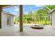 Screened-in pool and spa area with beautiful landscaping and ample space for relaxation at 18310 Bankston Pl, Tampa, FL 33647