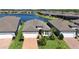 Beautiful home with lush landscaping, brick driveway, and serene lake view in a desirable community at 19442 Sea Glass Cir, Land O Lakes, FL 34638