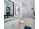 Modern bathroom with a shower-tub combo and stylish fixtures at 19442 Sea Glass Cir, Land O Lakes, FL 34638