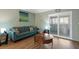 Cozy living room featuring stylish decor and sliding glass doors for natural light at 195 114Th Ne Ave # 195, St Petersburg, FL 33716