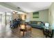 Living room features a comfortable couch, hardwood floors, and a wooden coffee table at 195 114Th Ne Ave # 195, St Petersburg, FL 33716