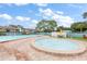 Take a refreshing dip in the pristine swimming pool or relax in the adjacent whirlpool with brick patio at 195 114Th Ne Ave # 195, St Petersburg, FL 33716