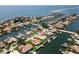 Beautiful aerial view of waterfront home situated on a canal with multiple docks and boats at 2015 Hawaii Ne Ave, St Petersburg, FL 33703