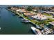 Beautiful waterfront backyard with private boat dock, patio, screened in pool area, and water views at 2015 Hawaii Ne Ave, St Petersburg, FL 33703