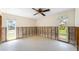 Bright bedroom with dual windows and natural light, primed for renovation and custom design at 2015 Hawaii Ne Ave, St Petersburg, FL 33703