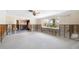 Bright living room with large window, offering renovation potential and a glimpse of outdoor scenery at 2015 Hawaii Ne Ave, St Petersburg, FL 33703