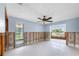 Light-filled living room with water views, awaiting renovation to create a dream living space at 2015 Hawaii Ne Ave, St Petersburg, FL 33703