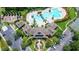Aerial view of community pool, clubhouse, tennis courts, parking and recreation areas at 20606 Whitewood Way, Tampa, FL 33647