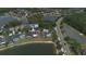 Beautiful aerial view of homes surrounding picturesque lakes in a lush, green community at 20606 Whitewood Way, Tampa, FL 33647