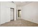 Carpeted bedroom with closet and bathroom at 20606 Whitewood Way, Tampa, FL 33647