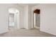 Carpeted bedroom with multiple doorways at 20606 Whitewood Way, Tampa, FL 33647