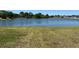 The neighborhood features a beautiful lake with scenic views and grassy shorelines at 20606 Whitewood Way, Tampa, FL 33647