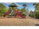 Community playground featuring slides and climbing structures; a fun and safe play space for children at 20606 Whitewood Way, Tampa, FL 33647