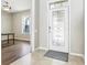 Welcoming foyer with tile flooring and a decorative glass door at 2127 Landside Dr, Valrico, FL 33594