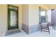 Close-up of the decorative front door with stylish stonework and a welcome mat at 2127 Landside Dr, Valrico, FL 33594