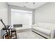 Comfortable living room with a cozy couch and space for musical instruments at 2127 Landside Dr, Valrico, FL 33594