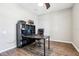 Office space features a black desk with computer and ample storage at 2127 Landside Dr, Valrico, FL 33594