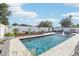 Beautiful backyard pool with a well-kept garden and privacy fence at 2127 Landside Dr, Valrico, FL 33594