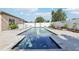Beautiful in-ground pool with an attached jacuzzi surrounded by a patio and white fence, offering privacy and space for relaxation at 2127 Landside Dr, Valrico, FL 33594