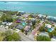 Beautiful waterfront homes with lush lawns and mature trees with water access for boats and yachts at 225 Cevera Dr, Dunedin, FL 34698