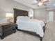 Comfortable bedroom featuring a ceiling fan and neutral-toned walls at 2486 Indian E Trl, Palm Harbor, FL 34683