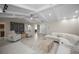 Open-concept living room featuring vaulted ceilings, stylish furnishings, and an inviting atmosphere at 2486 Indian E Trl, Palm Harbor, FL 34683
