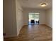 Bright bedroom boasting sliding glass doors to lanai, vinyl floors and double closets at 24862 Us Highway 19 N # 2303, Clearwater, FL 33763