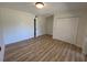 Light and airy bedroom with vinyl flooring, double closets and neutral walls at 24862 Us Highway 19 N # 2303, Clearwater, FL 33763