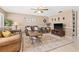 Cozy living room featuring comfortable leather sofas, a large rug, and neutral color scheme at 251 Dunbridge Dr, Palm Harbor, FL 34684