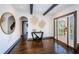 Elegant foyer boasting dark wood floors, modern decor, and arched entryway with an abundance of natural light at 2536 Burlington N Ave, St Petersburg, FL 33713