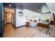 Comfortable living room area featuring a sectional, decor and hardwood floors at 2536 Burlington N Ave, St Petersburg, FL 33713