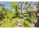 Picturesque backyard with a bridge leading to a wooden deck at 2613 59Th S St, Gulfport, FL 33707