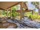 Beautiful backyard with stone accents and lush greenery at 2613 59Th S St, Gulfport, FL 33707