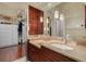 Bathroom with double vanity, granite countertops, and custom cabinets at 2613 59Th S St, Gulfport, FL 33707