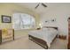 Bright bedroom featuring neutral walls, large window and decorative art at 2613 59Th S St, Gulfport, FL 33707