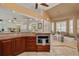 Kitchen with breakfast nook, custom cabinets, and marble countertops at 2613 59Th S St, Gulfport, FL 33707