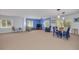 Open-concept living area with ample space for dining and relaxation with lots of natural light at 2613 59Th S St, Gulfport, FL 33707